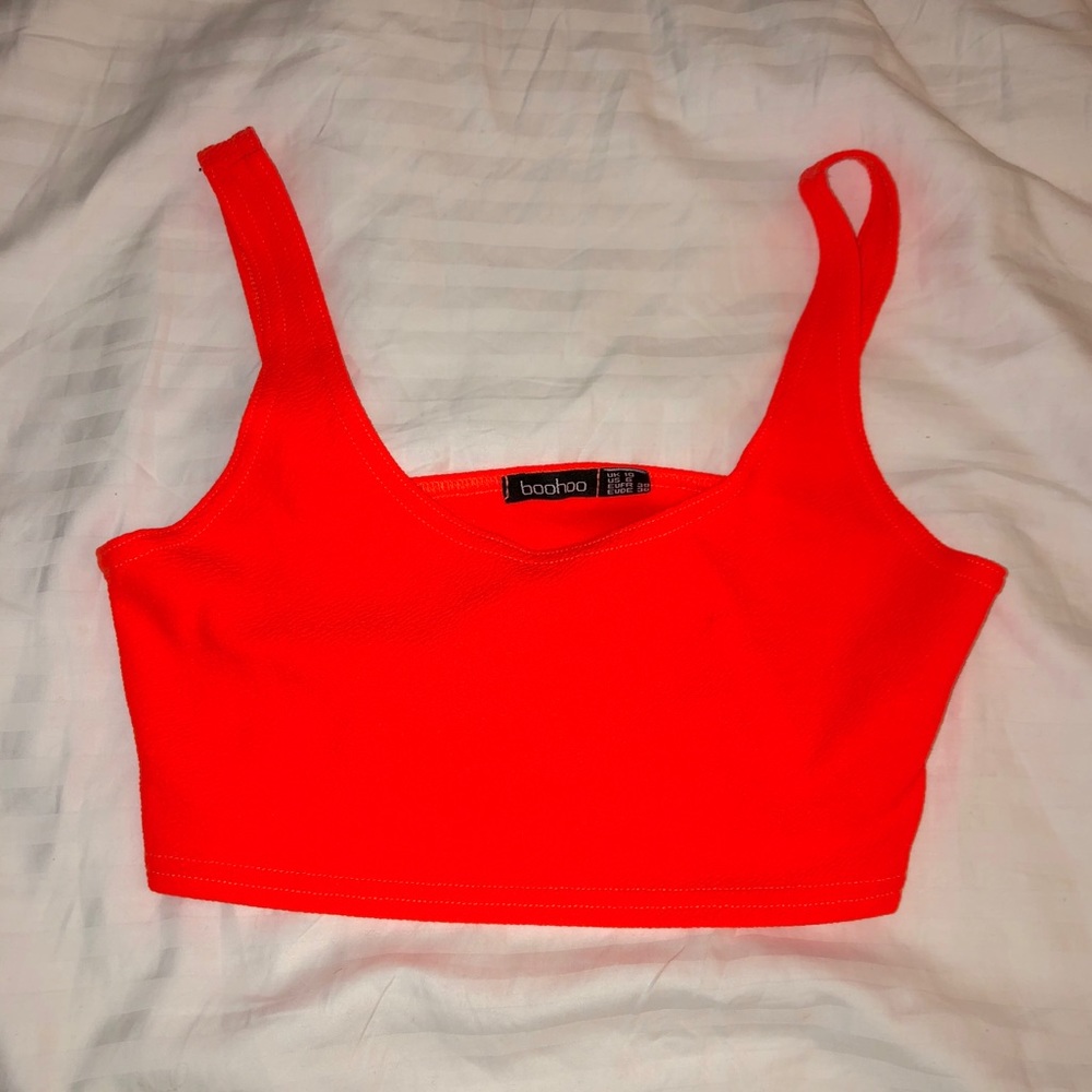 Neon orange crop top.